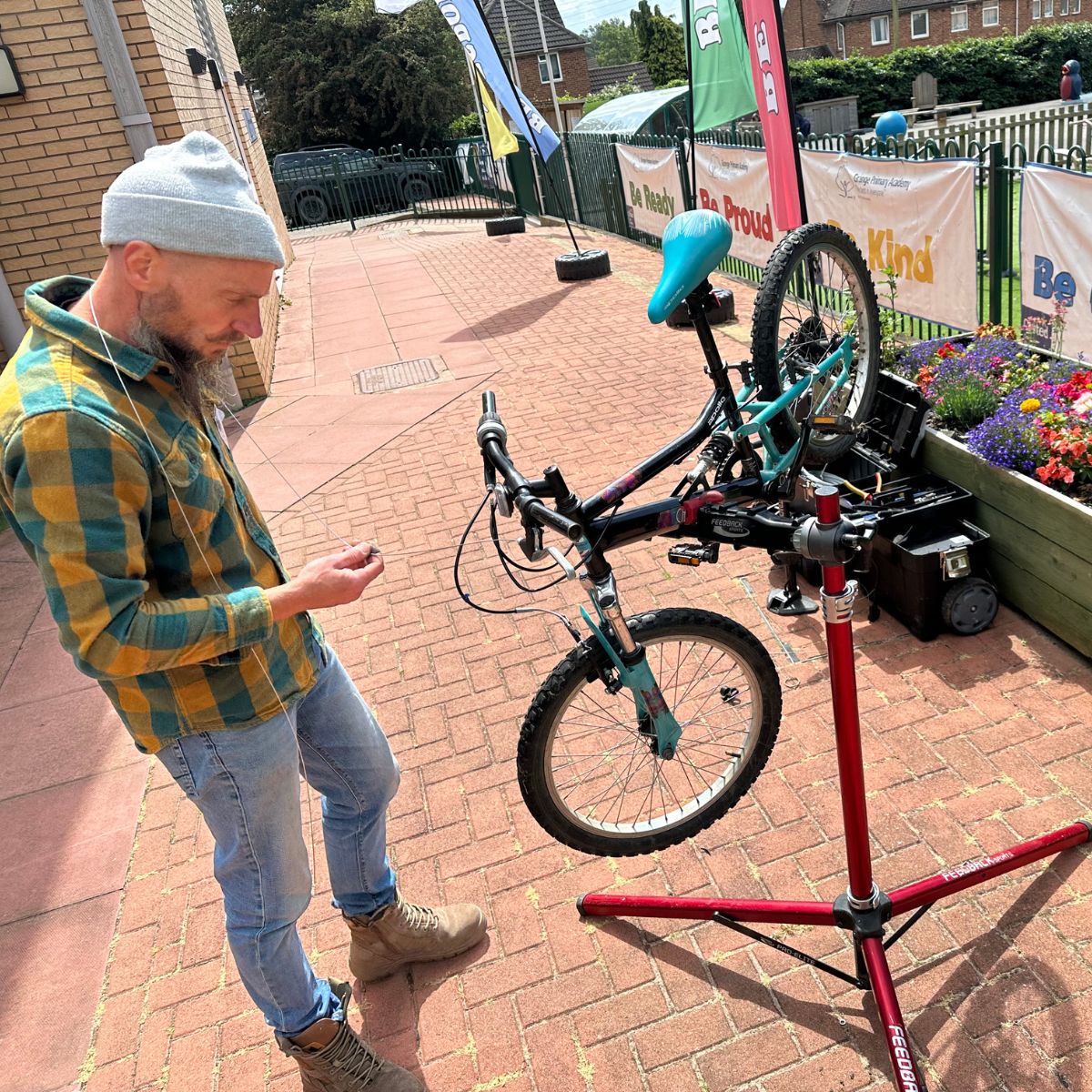 Cycle Mechanic fixing a bicycle