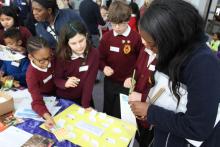 School children in class with teacher