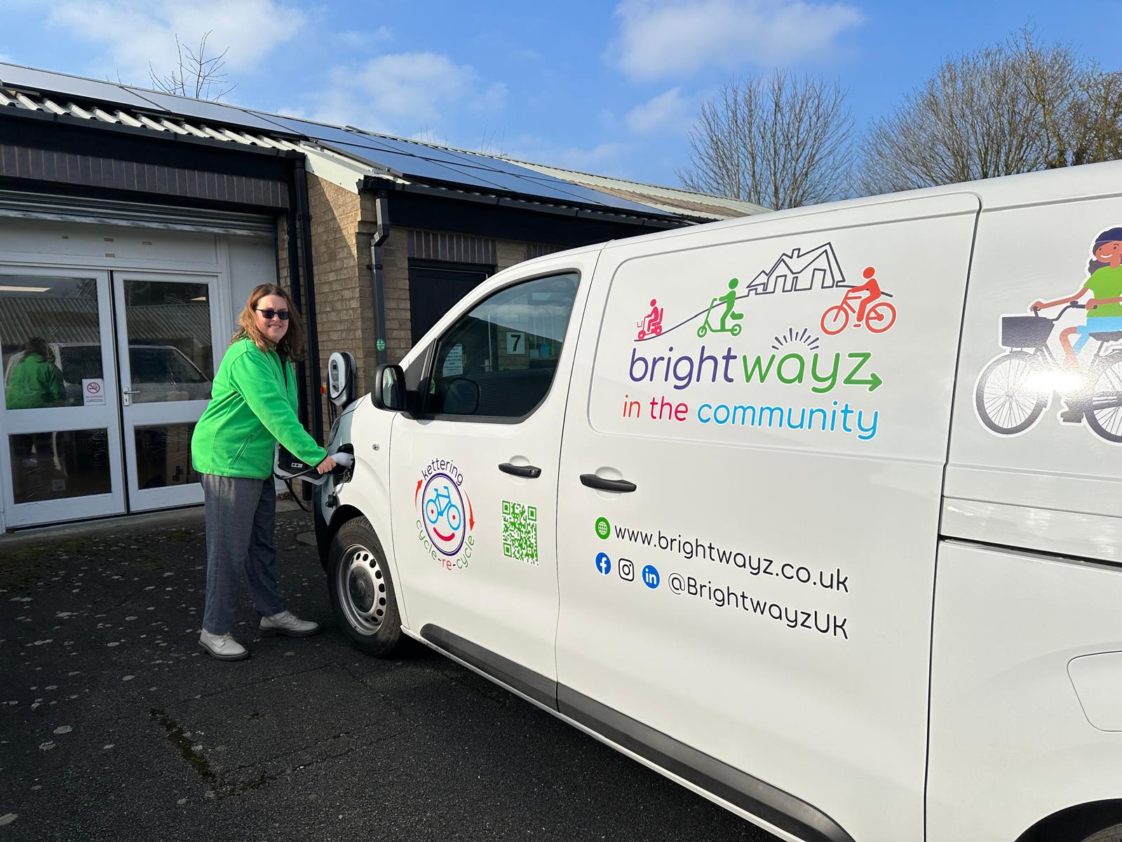 E van being charged .