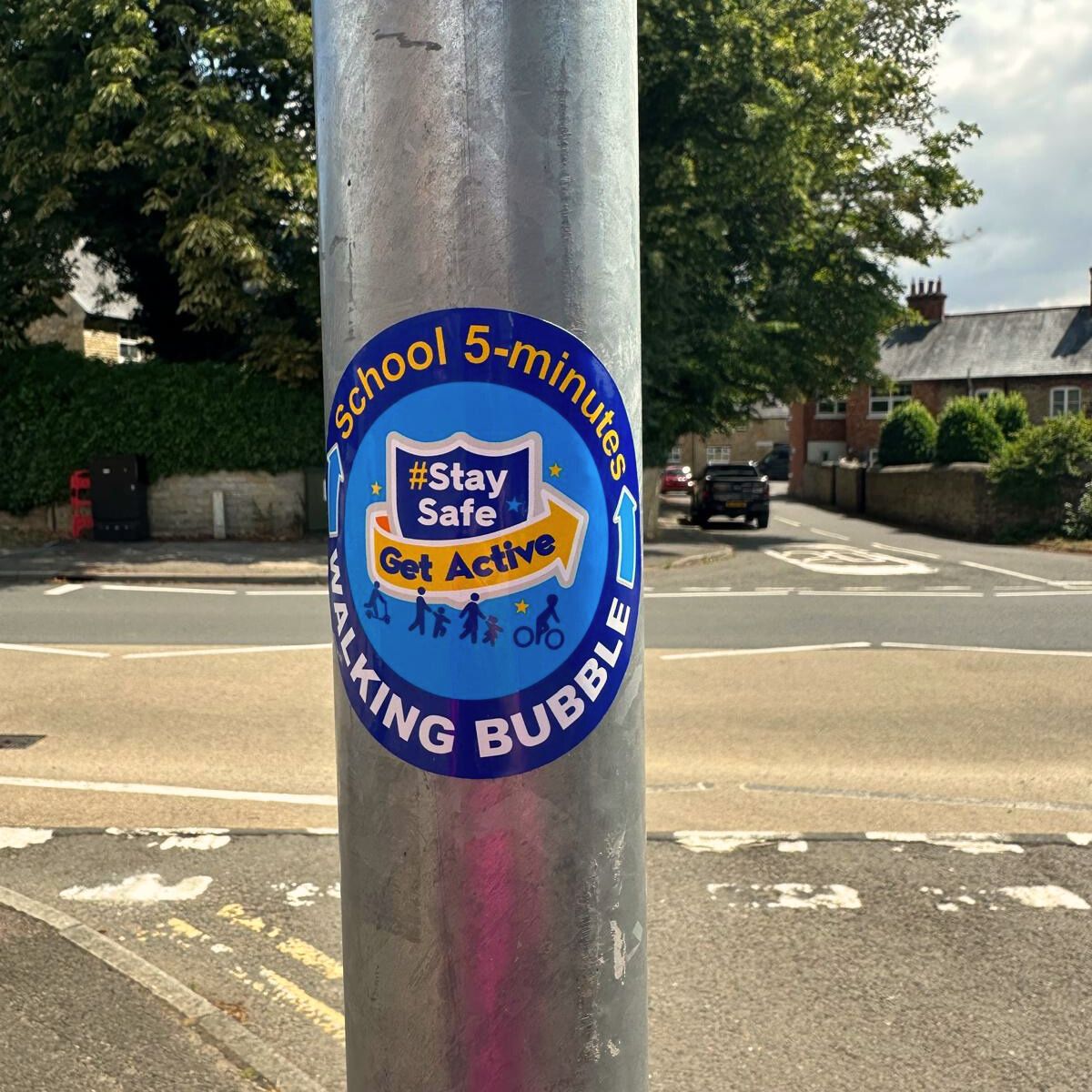 lamp post sticker in use with 5mins to school walking bubble design