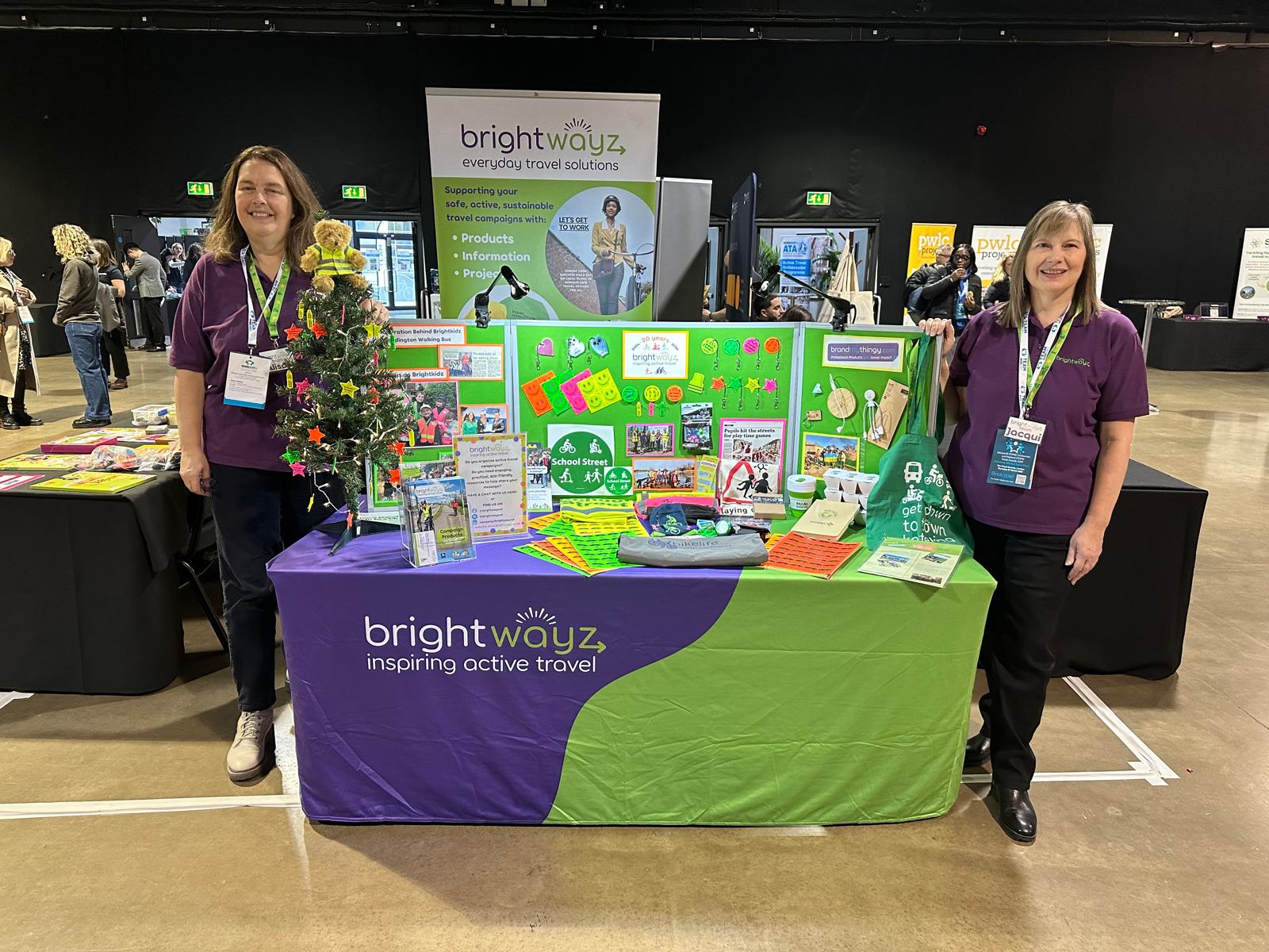Team Modeshift conference stall with Jacqui and Alison .