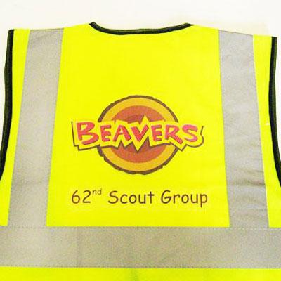 Yellow waistcoat with print on the back.